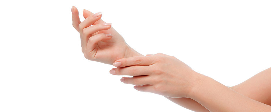 Woman hands with beautiful manicure isolated on white background